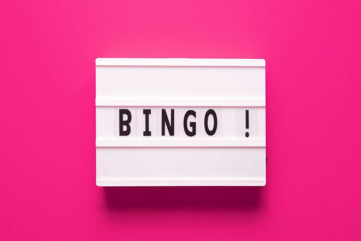 Lightbox with the word “Bingo” on a pink background, top view