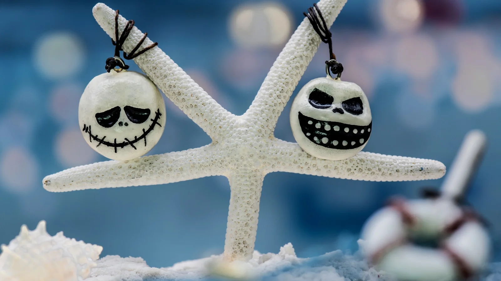 Nightmare Before Christmas–inspired decor featuring Jack Skellington and Oogie Boogie ornaments styled on a beach-themed display