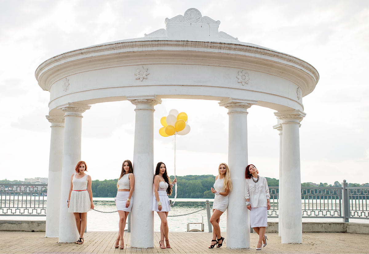 A group of females having a alluring photoshoot