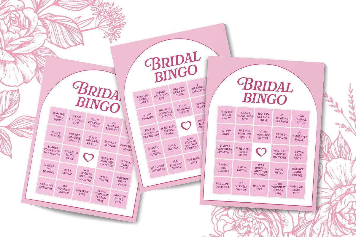 Pink bingo cards that say "bridal shower bingo" on a white background with pink flowers. 