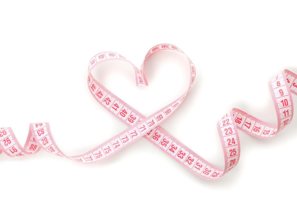 pink measuring tape in the shape of a heart