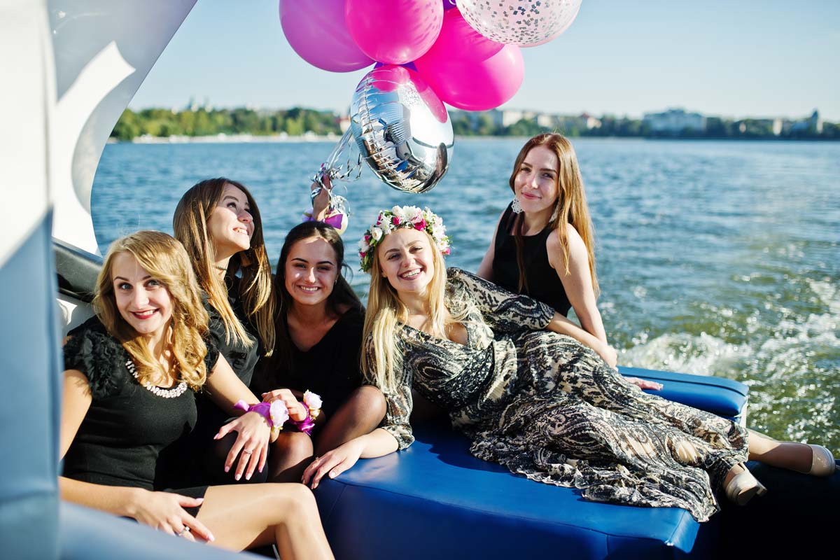 Friends having a celebration on a boat