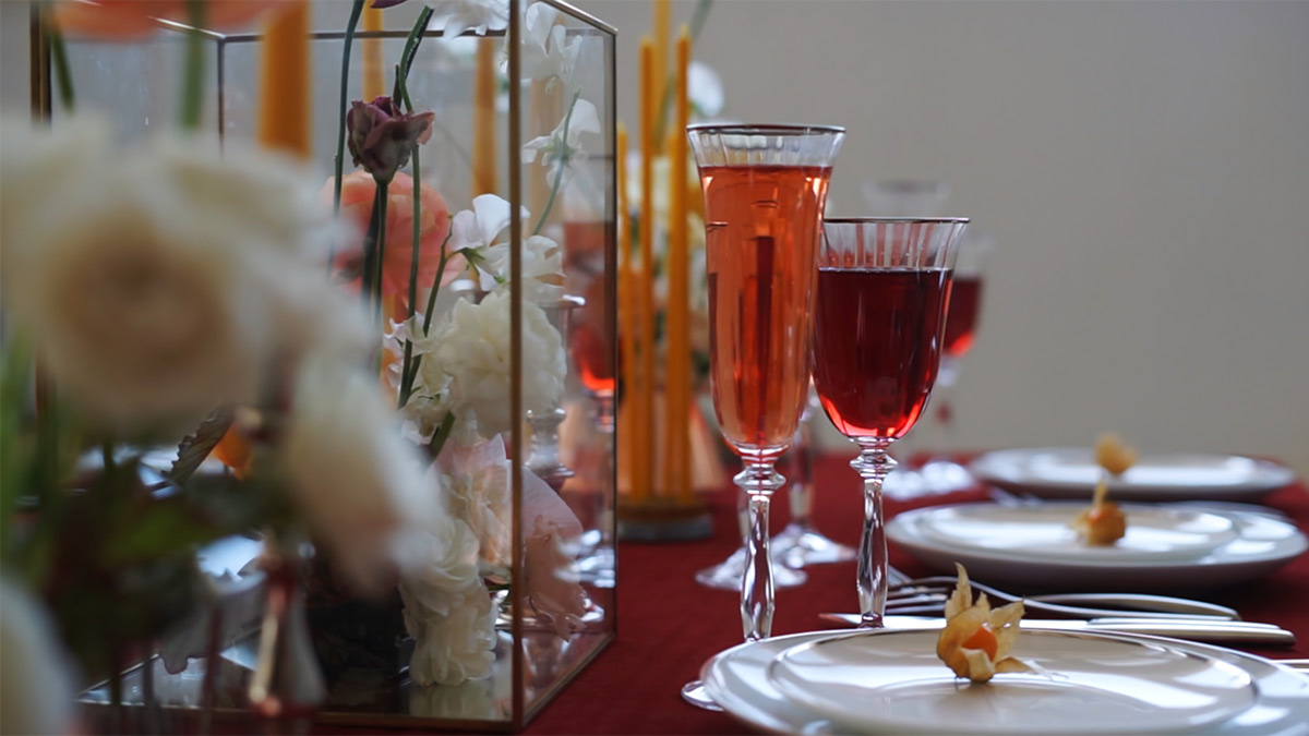 Table set up for a formal event with a variety of food and drink options