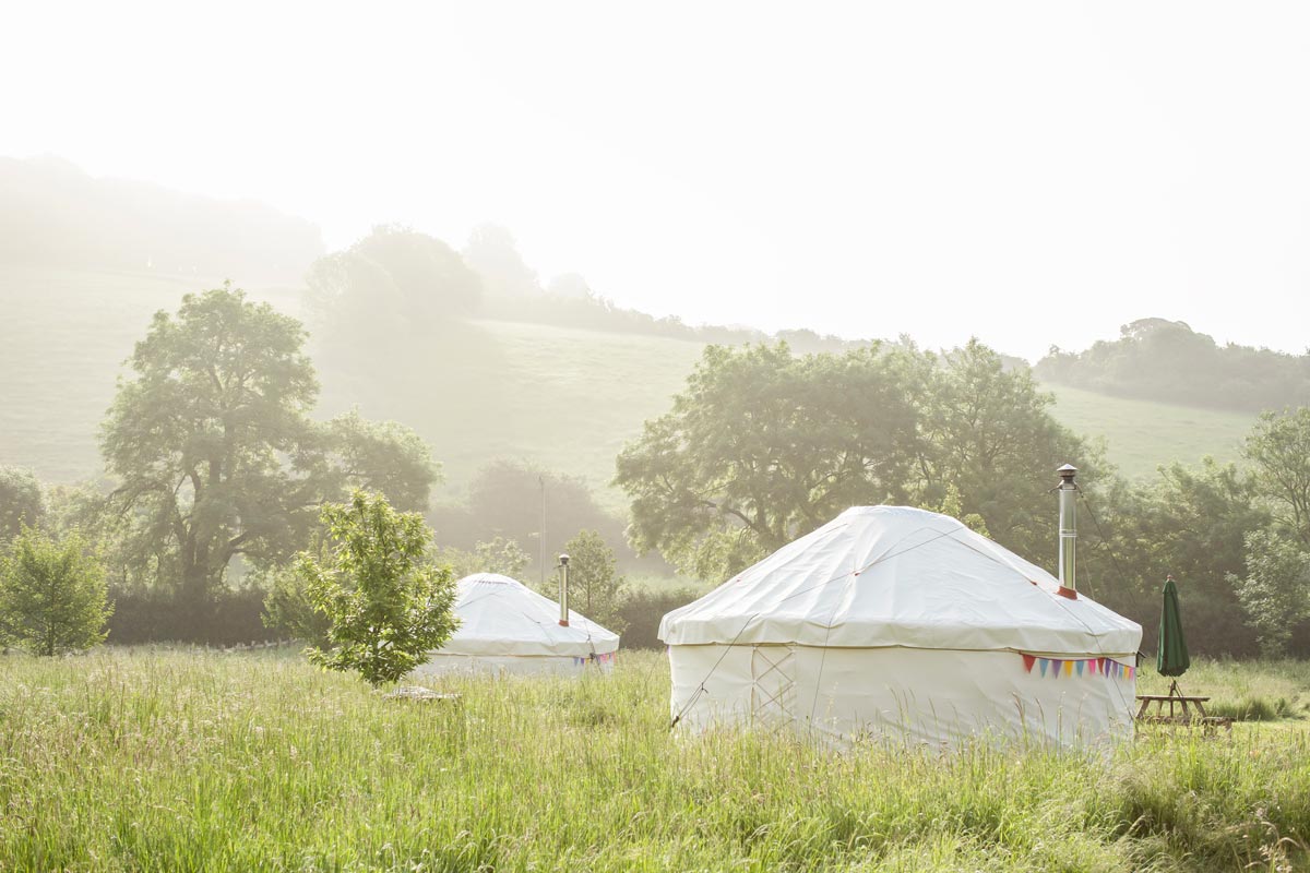 Scenic landscape with yurts set in the Dorset countryside