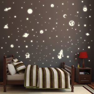 Glow in the dark stickers shaped like stars, moon, planets, astronauts, and planets. 