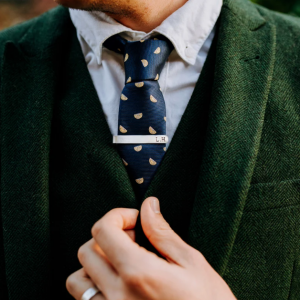 tie clip on a patterned tie